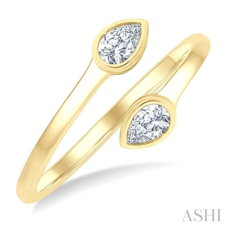 1/5 Ctw Split Single Coil Bezel Set Pear Cut Diamond Open Fashion Ring in 14K Yellow Gold 1/5 Ctw Split Single Coil Bezel Set Pear Cut Diamond Open Fashion Ring in 14K Yellow Gold