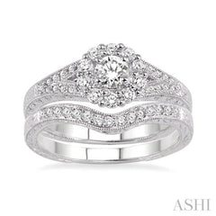 3/4 Ctw Diamond Wedding Set with 5/8 Ctw Round Cut Engagement Ring and 1/6 Ctw Wedding Band in 14K White Gold 3/4 Ctw Diamond Wedding Set with 5/8 Ctw Round Cut Engagement Ring and 1/6 Ctw Wedding Band in 14K White Gold