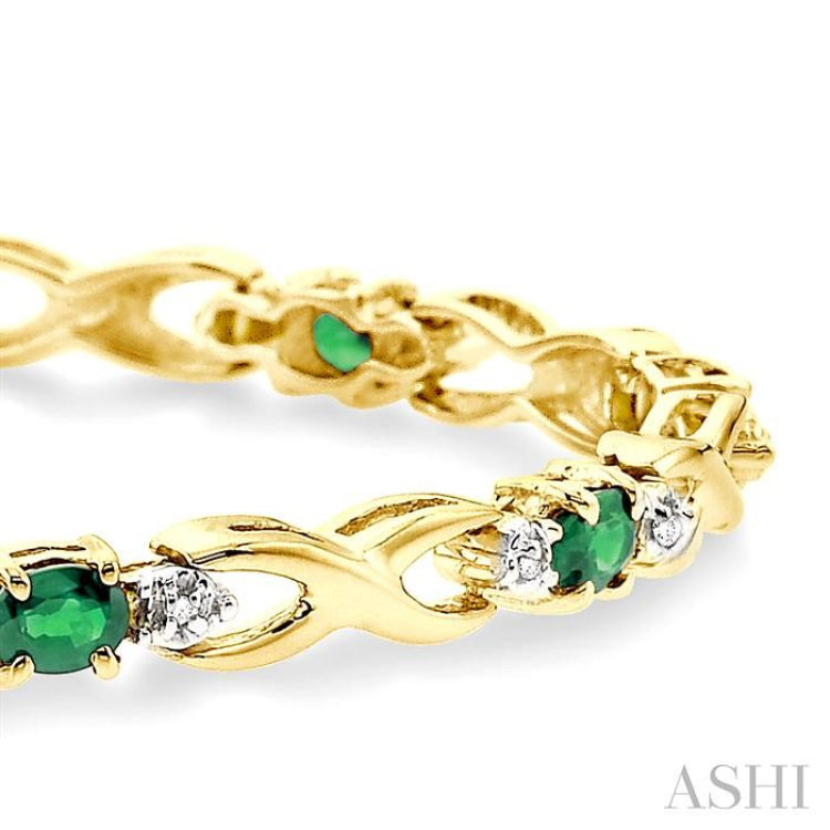 4x3 MM Oval Cut Emerald and 1/10 Ctw Single Cut Diamond Bracelet in 10K Yellow Gold 4x3 MM Oval Cut Emerald and 1/10 Ctw Single Cut Diamond Bracelet in 10K Yellow Gold
