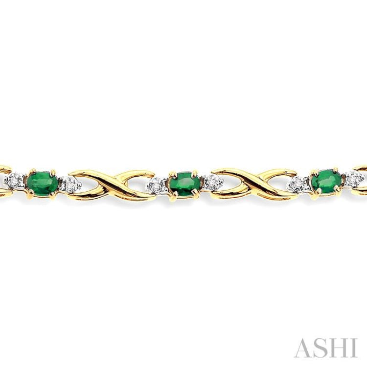 4x3 MM Oval Cut Emerald and 1/10 Ctw Single Cut Diamond Bracelet in 10K Yellow Gold 4x3 MM Oval Cut Emerald and 1/10 Ctw Single Cut Diamond Bracelet in 10K Yellow Gold