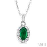 5x3 MM Oval Shape Emerald and 1/20 Ctw Round Cut Diamond Halo Precious Pendant with Chain in 14K White Gold