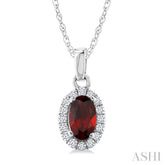 5x3 MM Oval Shape Garnet and 1/20 Ctw Round Cut Diamond Halo Semi-Precious Pendant with Chain in 10K White Gold