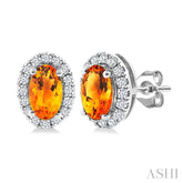 5x3 MM Oval Shape Citrine and 1/8 Ctw Round Cut Diamond Halo Semi-Precious Stud Earrings in 14K White Gold