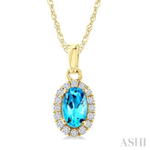 5x3 MM Oval Shape Blue Topaz and 1/20 Ctw Round Cut Diamond Halo Semi-Precious Pendant with Chain in 10K Yellow Gold