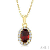 5x3 MM Oval Shape Garnet and 1/20 Ctw Round Cut Diamond Halo Semi-Precious Pendant with Chain in 10K Yellow Gold