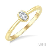 1/5 Ctw Bezel Set Oval Cut Diamond Fashion Ring in 14K Yellow Gold