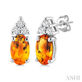 1/20 Ctw Oval Cut 5X3 MM Citrine and Round Cut Diamond semi-precious Earrings in 10K White Gold