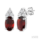 1/20 Ctw Oval Cut 5X3 MM Garnet and Round Cut Diamond semi-precious Earrings in 10K White Gold