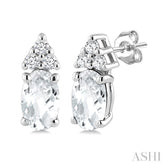 1/20 Ctw Oval Cut 5X3 MM White Topaz and Round Cut Diamond semi-precious Earrings in 10K White Gold