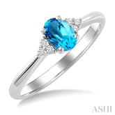 1/20 Ctw Oval Cut 6X4 MM Blue Topaz and Round Cut Diamond semi-precious Ring in 10K White Gold