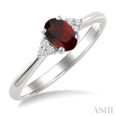 1/20 Ctw Oval Cut 6X4 MM Garnet and Round Cut Diamond semi-precious Ring in 10K White Gold
