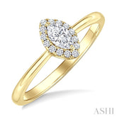 1/4 Ctw Marquise and Round Cut Diamond Fashion Halo Ring in 14K Yellow Gold