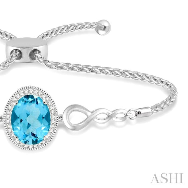 10x8 MM Oval Shape Blue Topaz and 1/20 Ctw Round shape Diamond Sterling Silver Lariat Bracelet 10x8 MM Oval Shape Blue Topaz and 1/20 Ctw Round shape Diamond Sterling Silver Lariat Bracelet