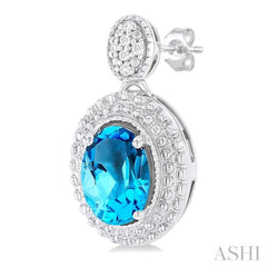 7X5 MM Oval Cut Blue Topaz and 1/20 ctw Round Cut Diamond Semi-Precious Earring in Sterling Silver 7X5 MM Oval Cut Blue Topaz and 1/20 ctw Round Cut Diamond Semi-Precious Earring in Sterling Silver