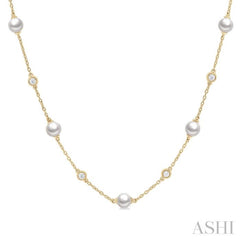 5 MM Round Shape Cultured Pearls and 1/4 Ctw Round Cut Diamond Station Necklace in 14K Yellow Gold 5 MM Round Shape Cultured Pearls and 1/4 Ctw Round Cut Diamond Station Necklace in 14K Yellow Gold