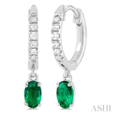 5x3 MM Oval Cut Emerald and 1/8 Ctw Petite Round Cut Diamond Precious Fashion Huggies in 10K White Gold