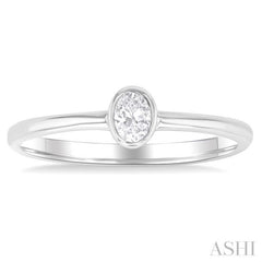 1/6 Ctw Petite Bezel Set Oval Cut Diamond Fashion Ring in 10K White Gold 1/6 Ctw Petite Bezel Set Oval Cut Diamond Fashion Ring in 10K White Gold