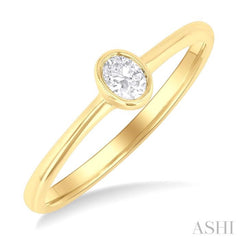 1/6 Ctw Petite Bezel Set Oval Cut Diamond Fashion Ring in 10K Yellow Gold 1/6 Ctw Petite Bezel Set Oval Cut Diamond Fashion Ring in 10K Yellow Gold