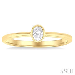 1/6 Ctw Petite Bezel Set Oval Cut Diamond Fashion Ring in 10K Yellow Gold 1/6 Ctw Petite Bezel Set Oval Cut Diamond Fashion Ring in 10K Yellow Gold