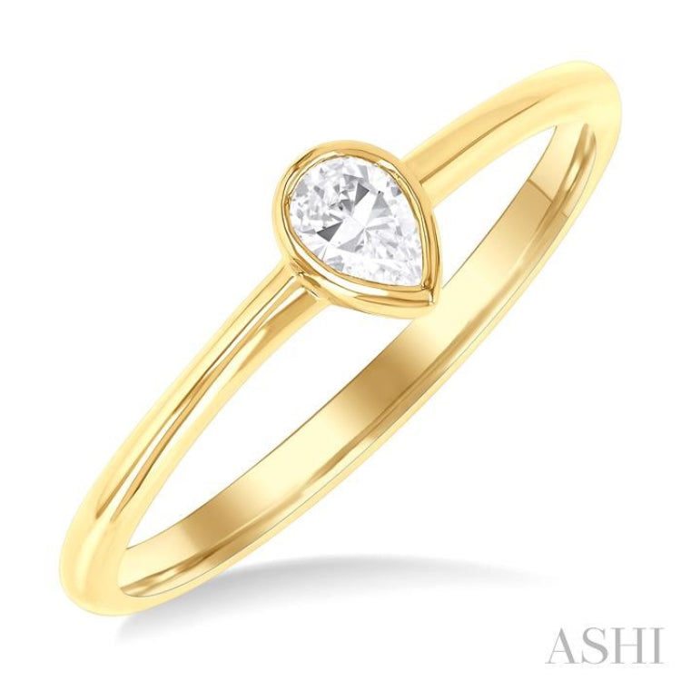 1/6 Ctw Petite Bezel Set Pear Cut Diamond Fashion Ring in 10K Yellow Gold 1/6 Ctw Petite Bezel Set Pear Cut Diamond Fashion Ring in 10K Yellow Gold