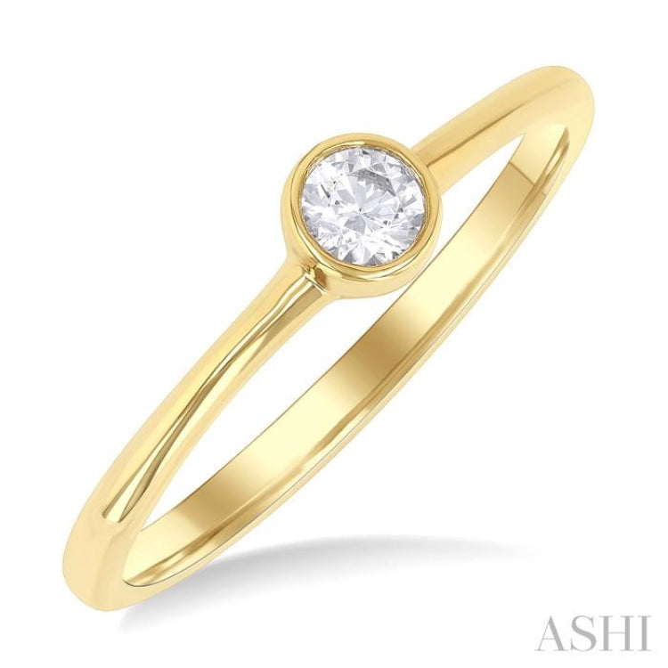 1/6 Ctw Petite Bezel Set Round Cut Diamond Fashion Ring in 10K Yellow Gold 1/6 Ctw Petite Bezel Set Round Cut Diamond Fashion Ring in 10K Yellow Gold