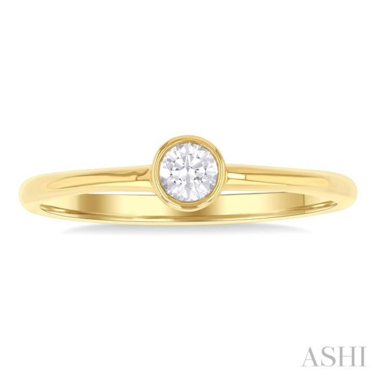 1/6 Ctw Petite Bezel Set Round Cut Diamond Fashion Ring in 10K Yellow Gold 1/6 Ctw Petite Bezel Set Round Cut Diamond Fashion Ring in 10K Yellow Gold