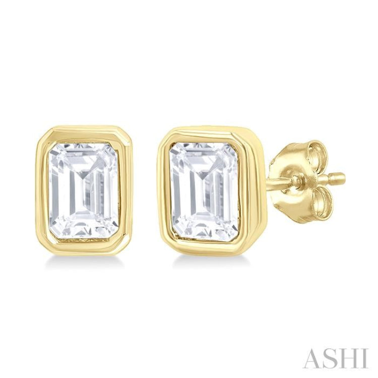 1/5 Ctw Petite Bezel Set Emerald Cut Diamond Fashion Stud Earring in 10K Yellow Gold 1/5 Ctw Petite Bezel Set Emerald Cut Diamond Fashion Stud Earring in 10K Yellow Gold