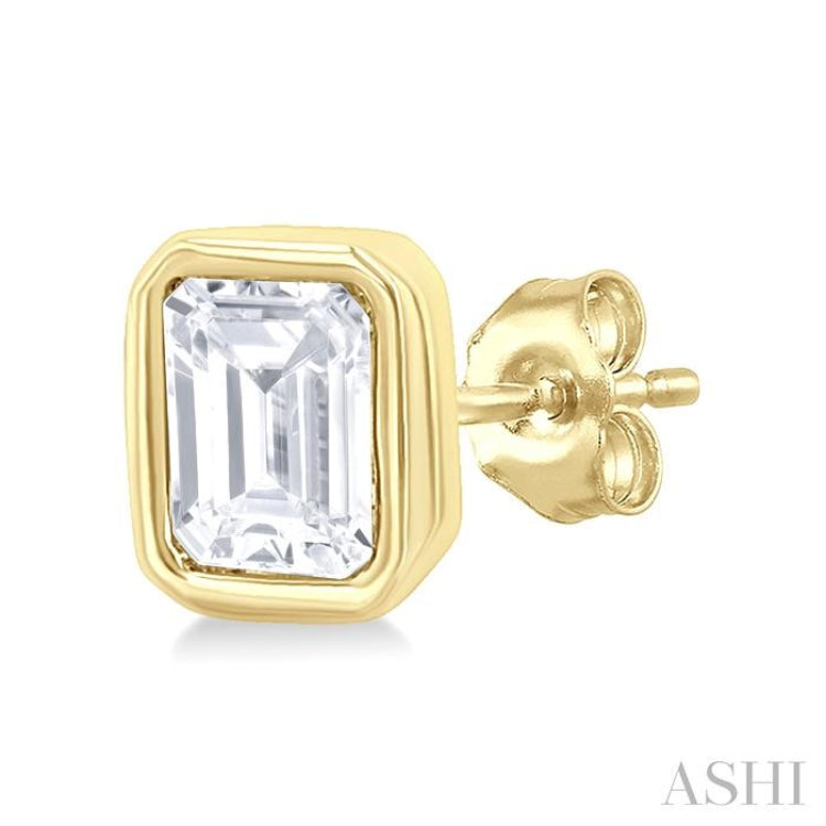 1/5 Ctw Petite Bezel Set Emerald Cut Diamond Fashion Stud Earring in 10K Yellow Gold 1/5 Ctw Petite Bezel Set Emerald Cut Diamond Fashion Stud Earring in 10K Yellow Gold