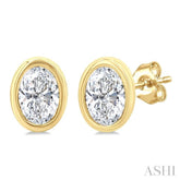 1/5 Ctw Petite Bezel Set Oval Cut Diamond Fashion Stud Earrings in 10K Yellow Gold