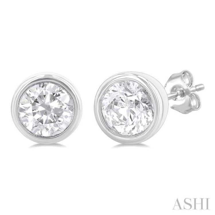 1/5 Ctw Petite Bezel Set Round Cut Diamond Fashion Stud Earring in 10K White Gold 1/5 Ctw Petite Bezel Set Round Cut Diamond Fashion Stud Earring in 10K White Gold
