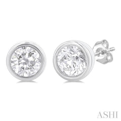 1/5 Ctw Petite Bezel Set Round Cut Diamond Fashion Stud Earring in 10K White Gold 1/5 Ctw Petite Bezel Set Round Cut Diamond Fashion Stud Earring in 10K White Gold