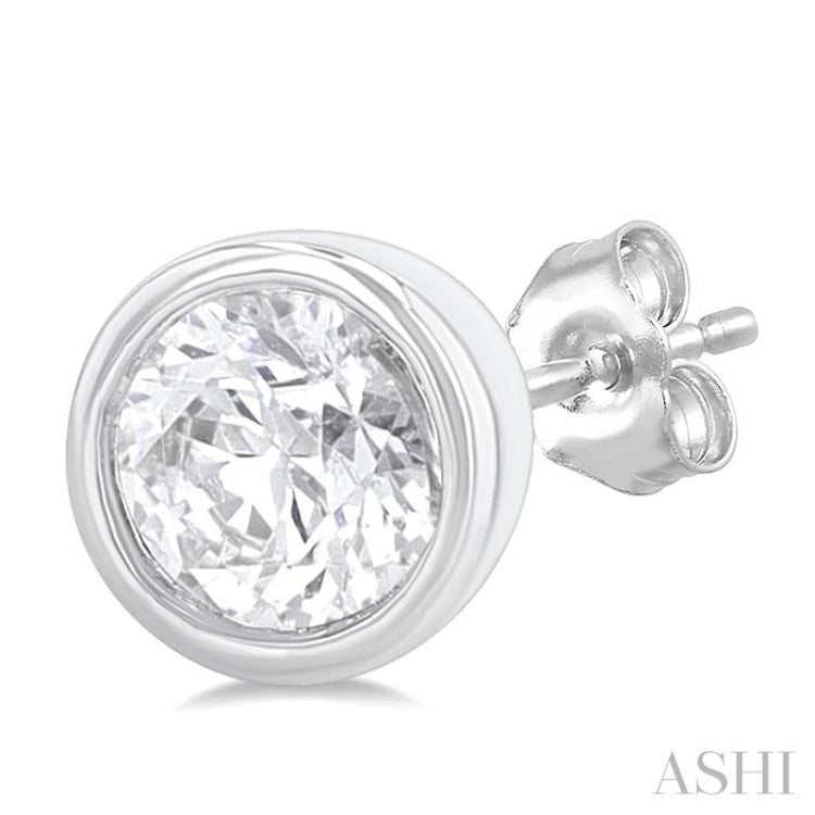 1/5 Ctw Petite Bezel Set Round Cut Diamond Fashion Stud Earring in 10K White Gold 1/5 Ctw Petite Bezel Set Round Cut Diamond Fashion Stud Earring in 10K White Gold