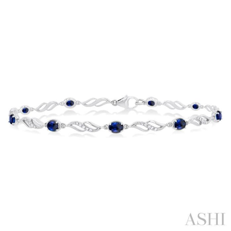 4X3 MM Oval Cut Sapphire and 1/5 Ctw Round Cut Diamond Precious Eternity Link Tennis Bracelet in 10K White Gold 4X3 MM Oval Cut Sapphire and 1/5 Ctw Round Cut Diamond Precious Eternity Link Tennis Bracelet in 10K White Gold