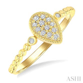 1/8 Ctw Petite Bead Shank Pear Shape Center Round Cut Diamond Fashion Ring in 10K Yellow Gold