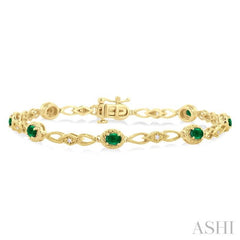 1/20 Ctw Oval Cut 4X3MM Emerald and Round Cut Diamond Precious Fashion Bracelet in 10K Yellow Gold 1/20 Ctw Oval Cut 4X3MM Emerald and Round Cut Diamond Precious Fashion Bracelet in 10K Yellow Gold