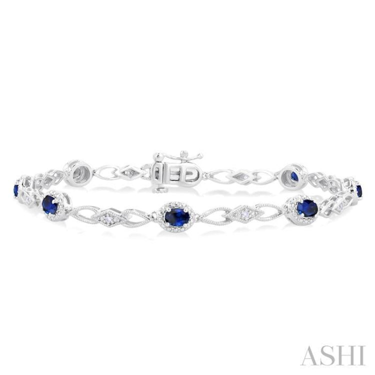 1/20 Ctw Oval Cut 4X3MM Sapphire and Round Cut Diamond Precious Fashion Bracelet in 10K White Gold 1/20 Ctw Oval Cut 4X3MM Sapphire and Round Cut Diamond Precious Fashion Bracelet in 10K White Gold