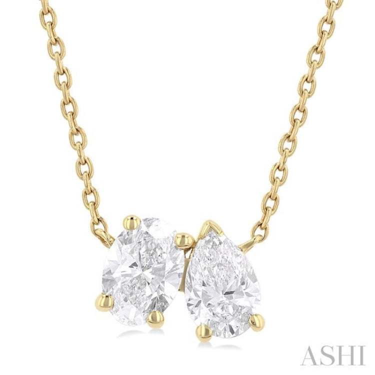 3/4 Ctw Toi Et Moi Oval and Pear Cut Diamond Pendant in 14K Yellow Gold 3/4 Ctw Toi Et Moi Oval and Pear Cut Diamond Pendant in 14K Yellow Gold