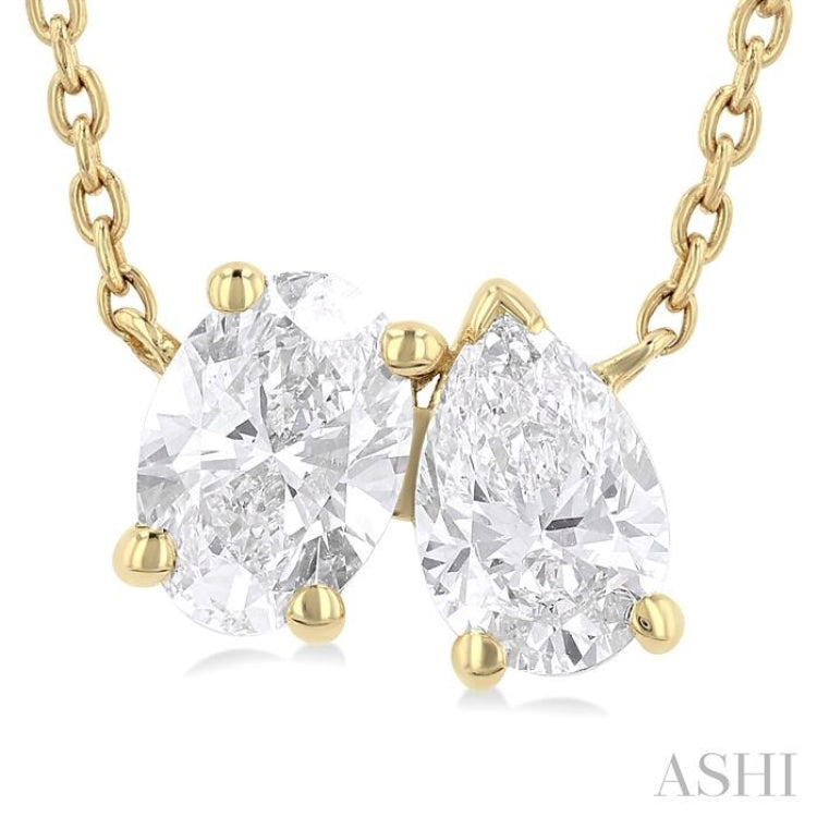 3/4 Ctw Toi Et Moi Oval and Pear Cut Diamond Pendant in 14K Yellow Gold 3/4 Ctw Toi Et Moi Oval and Pear Cut Diamond Pendant in 14K Yellow Gold