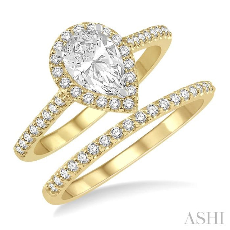 7/8 Ctw Diamond Wedding Set With 3/4 Ctw Pear Cut Engagement Ring and 1/6 Ctw Wedding Band in 14K Yellow and White Gold 7/8 Ctw Diamond Wedding Set With 3/4 Ctw Pear Cut Engagement Ring and 1/6 Ctw Wedding Band in 14K Yellow and White Gold