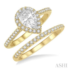 7/8 Ctw Diamond Wedding Set With 3/4 Ctw Pear Cut Engagement Ring and 1/6 Ctw Wedding Band in 14K Yellow and White Gold 7/8 Ctw Diamond Wedding Set With 3/4 Ctw Pear Cut Engagement Ring and 1/6 Ctw Wedding Band in 14K Yellow and White Gold
