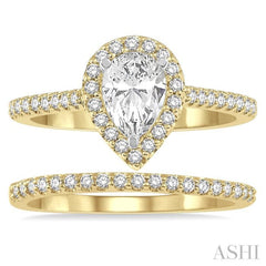 7/8 Ctw Diamond Wedding Set With 3/4 Ctw Pear Cut Engagement Ring and 1/6 Ctw Wedding Band in 14K Yellow and White Gold 7/8 Ctw Diamond Wedding Set With 3/4 Ctw Pear Cut Engagement Ring and 1/6 Ctw Wedding Band in 14K Yellow and White Gold