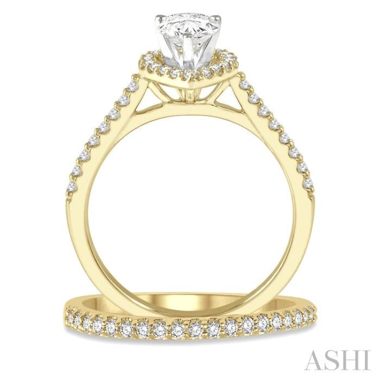 7/8 Ctw Diamond Wedding Set With 3/4 Ctw Pear Cut Engagement Ring and 1/6 Ctw Wedding Band in 14K Yellow and White Gold 7/8 Ctw Diamond Wedding Set With 3/4 Ctw Pear Cut Engagement Ring and 1/6 Ctw Wedding Band in 14K Yellow and White Gold