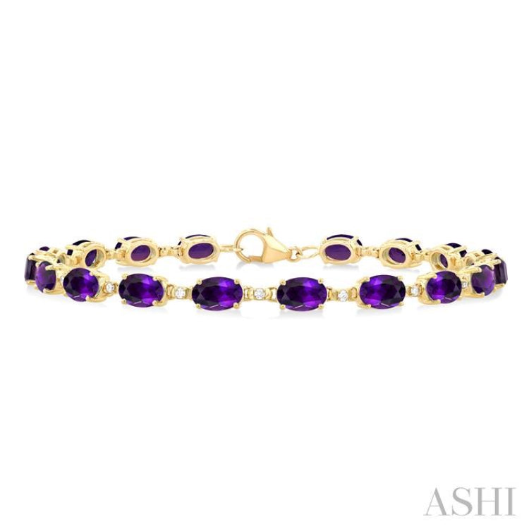 6X4 MM Oval Cut Amethyst and 1/6 Ctw Round Cut Diamond Semi-Precious Tennis Bracelet in 10K Yellow Gold 6X4 MM Oval Cut Amethyst and 1/6 Ctw Round Cut Diamond Semi-Precious Tennis Bracelet in 10K Yellow Gold