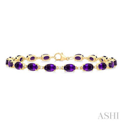 6X4 MM Oval Cut Amethyst and 1/6 Ctw Round Cut Diamond Semi-Precious Tennis Bracelet in 10K Yellow Gold 6X4 MM Oval Cut Amethyst and 1/6 Ctw Round Cut Diamond Semi-Precious Tennis Bracelet in 10K Yellow Gold