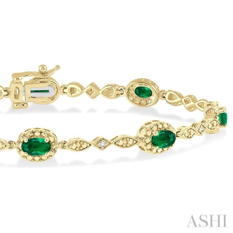 5x3 MM Oval Cut Emerald and 1/20 Ctw Single Cut Diamond Bracelet in 10K Yellow Gold 5x3 MM Oval Cut Emerald and 1/20 Ctw Single Cut Diamond Bracelet in 10K Yellow Gold