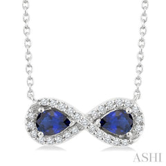 4X3 MM Pear Shape Sapphire and 1/10 Ctw Round Cut Diamond Precious Infinite Halo Pendant With Chain in 10K White Gold
