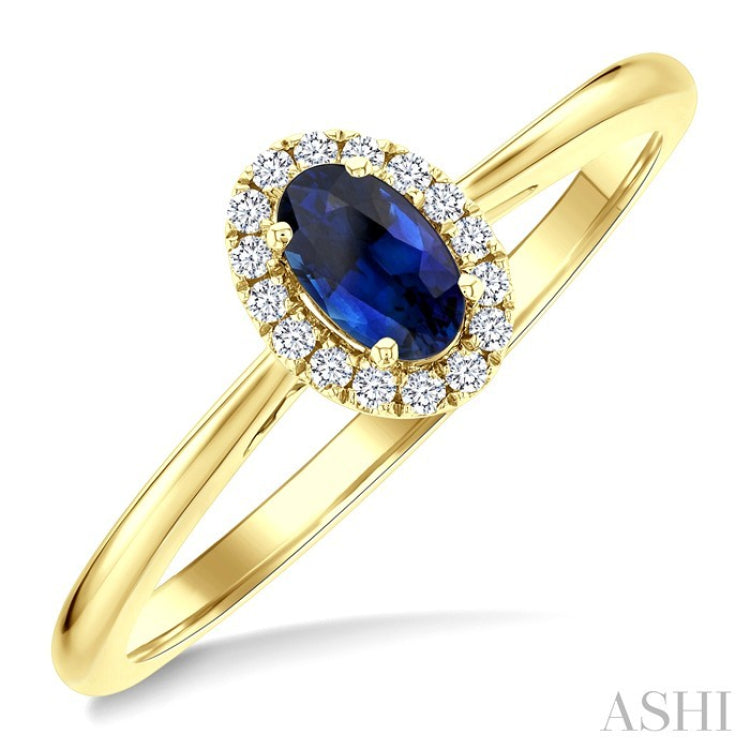 5x3 MM Oval Shape Sapphire and 1/20 Ctw Round Cut Diamond Halo Precious Ring in 10K Yellow Gold