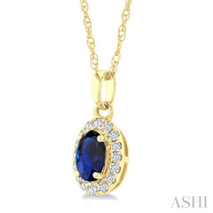 5x3 MM Oval Shape Sapphire and 1/20 Ctw Round Cut Diamond Halo Precious Pendant with Chain in 10K Yellow Gold