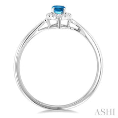 5x3 MM Oval Shape Blue Topaz and 1/20 Ctw Round Cut Diamond Halo Semi-Precious Ring in 14K White Gold