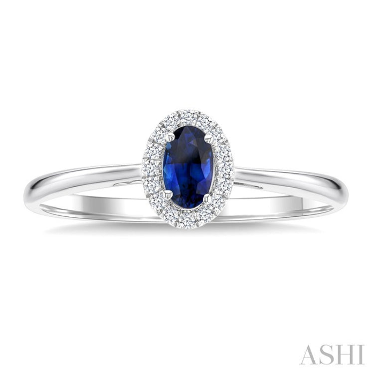 5x3 MM Oval Shape Sapphire and 1/20 Ctw Round Cut Diamond Halo Precious Ring in 14K White Gold